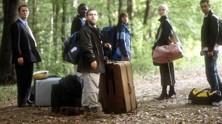 The cast of "Severance" in woods