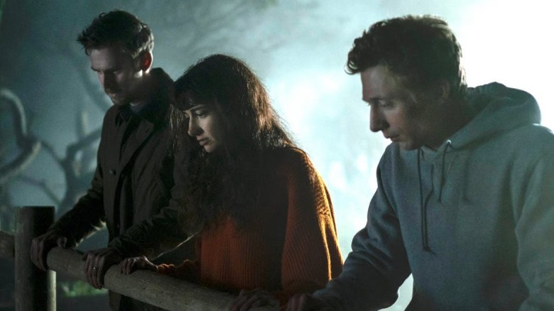 The cast of "The Rental" looking over a fence