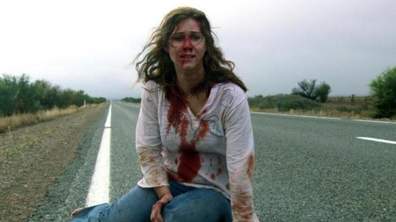 Kestie Morassi sitting on road