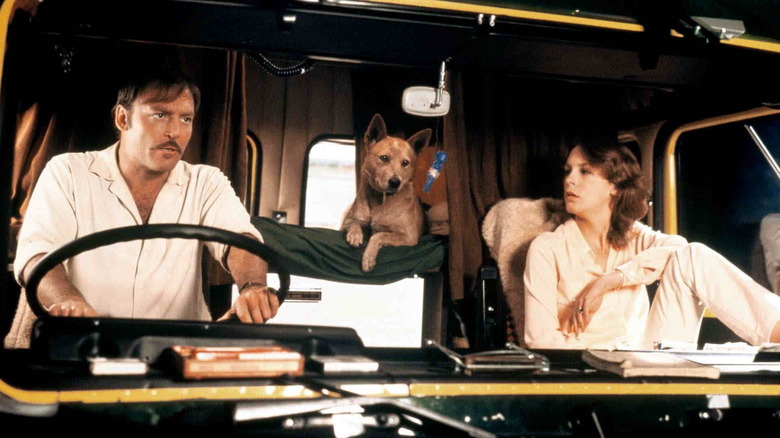 Stacy Keach and Jamie Lee Curtis in a semi cab