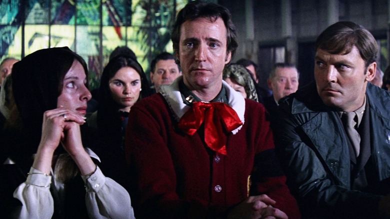 Scott Wilson and Stacy Keach in church