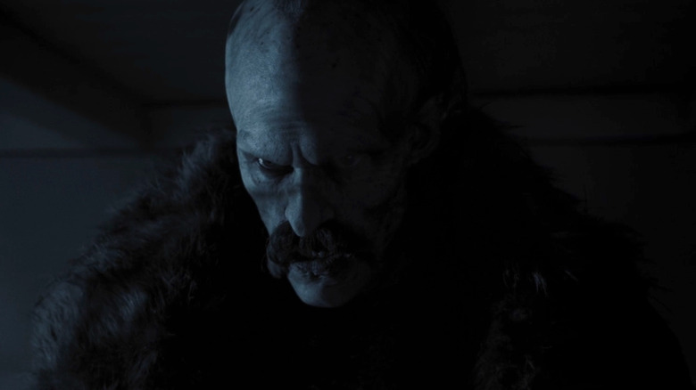 Bill Skarsgård as Count Orlock with a mustache in Nosferatu