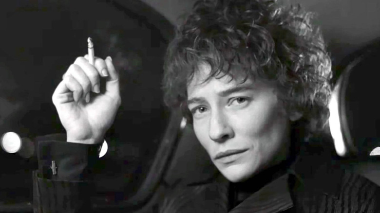 Cate Blanchett as Bob Dylan smoking in I'm Not There