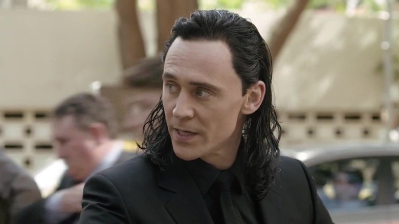 Tom Hiddleston as Loki looking to the side in Thor: Ragnarok