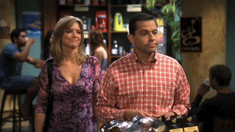 John Cryer in checkered shirt as Alan Harper in Two and a Half Men