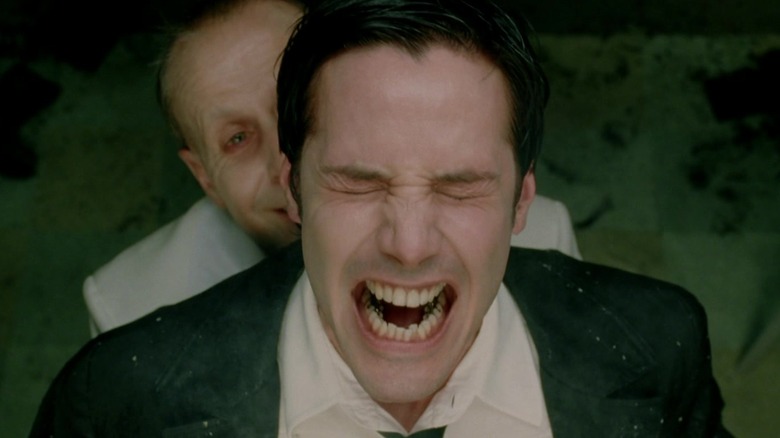 Keanu Reeves' Constantine gets some painful cancer removal from Peter Stormare's Satan
