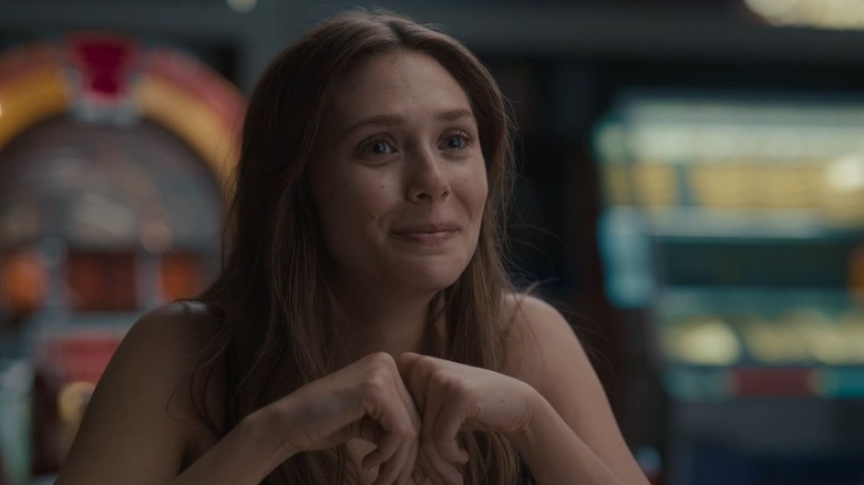 Elizabeth Olsen as Leigh laughing in Sorry For Your Loss