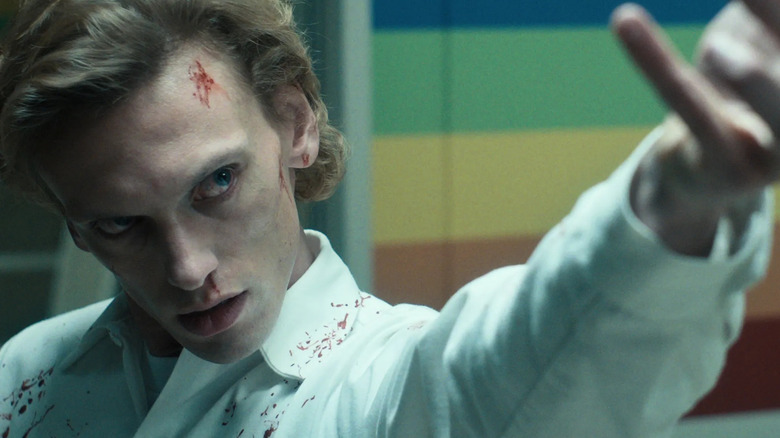Jamie Campbell Bower as Henry covered in blood in Stranger Things