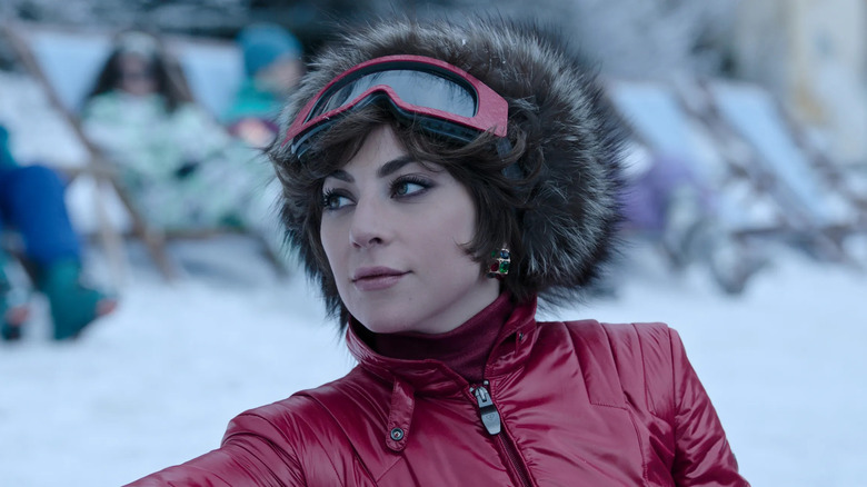 Lady Gaga as Patrizia wearing snow gear in House of Gucci