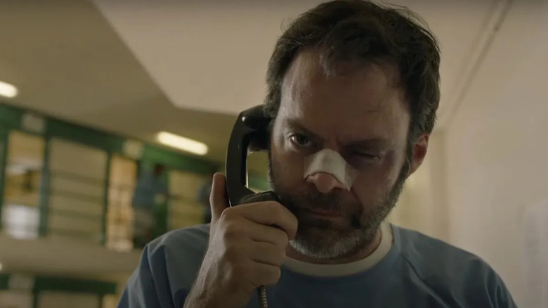 Bill Hader as Barry looking angry using a prison phone in Barry