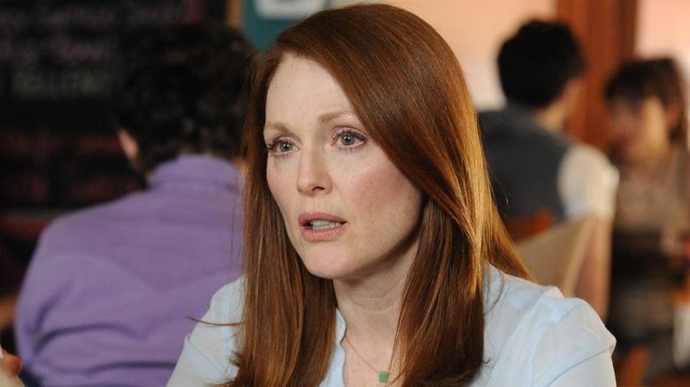 Julianne Moore as Alice sitting at a restaurant in Still Alice
