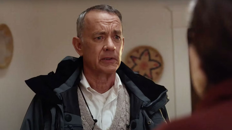 Tom Hanks as Otto talking to someone in A Man Called Otto