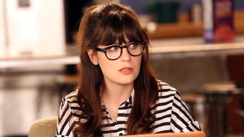 Zooey Deschanel as Jess looks nervous in New Girl