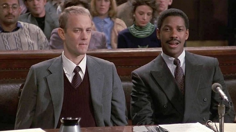 Tom Hanks and Denzel Washington as Andrew Beckett and Joe Miller sitting together in court in Philadelphia