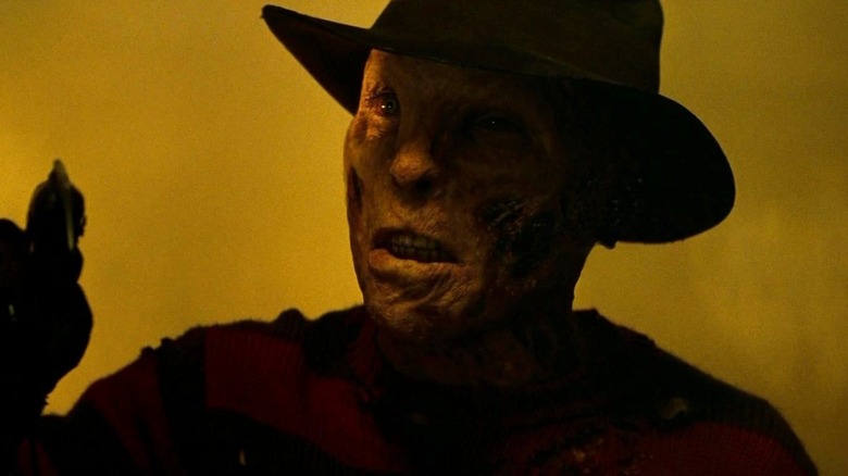 Jackie Earle Haley as Freddy Krueger pointing in A Nightmare on Elm Street