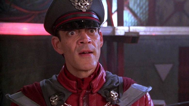 Raul Julia as M. Bison looking menacing in Street Fighter
