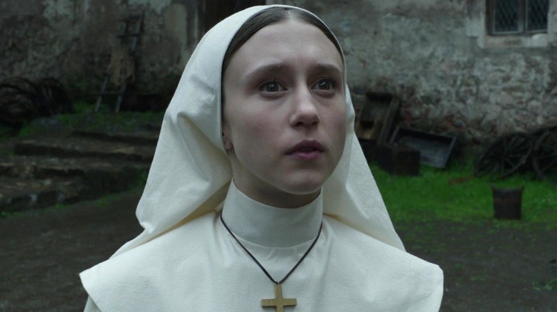 Taissa Farmiga as Sister Irene looking up in The Nun