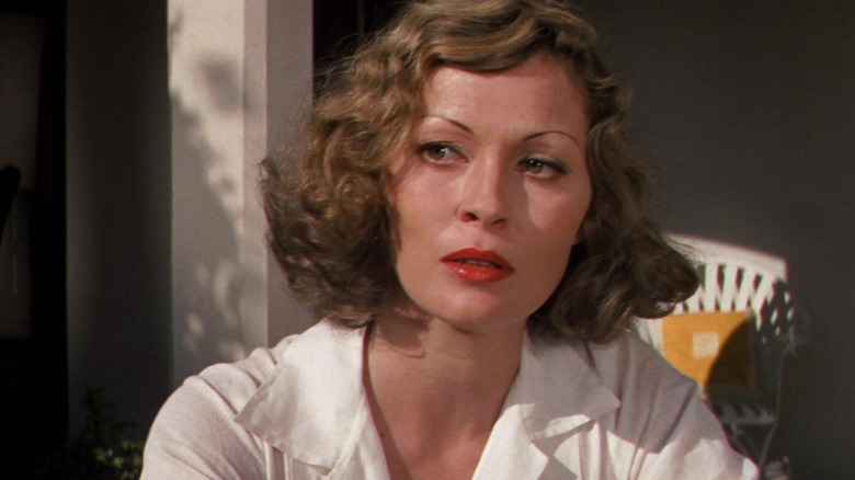 Faye Dunaway as Evelyn Cross-Mulwray stares intensely in Chinatown.