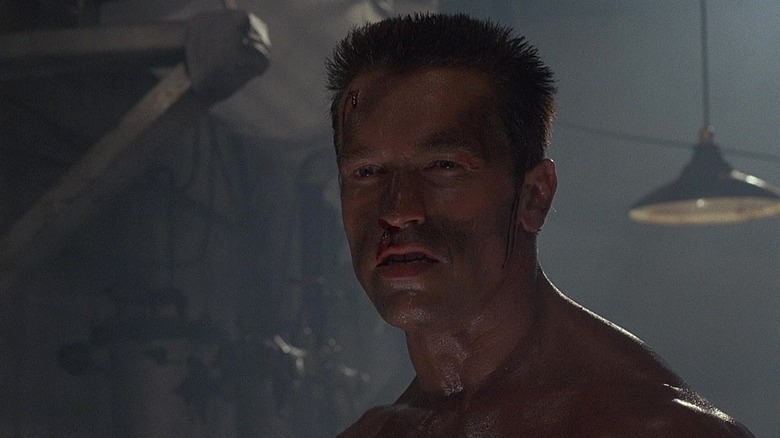 Arnold Schwarzenegger as John Matrix dispatches his foe with a wisecrack in Commando