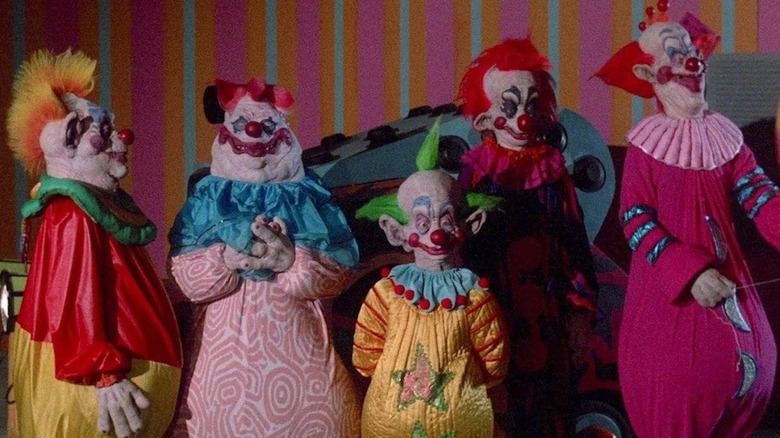 The Killer Klowns from outer space prepare to do as their name suggests