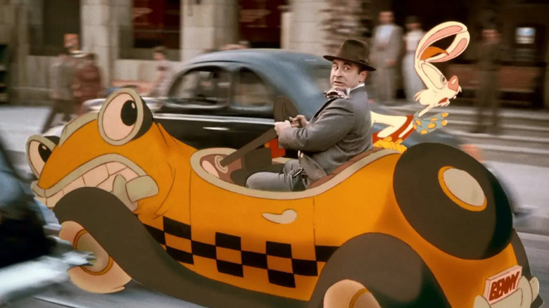 Bob Hoskins' Eddie Valiant in Benny the cab with Roger Rabbit in Who Framed Roger Rabbit