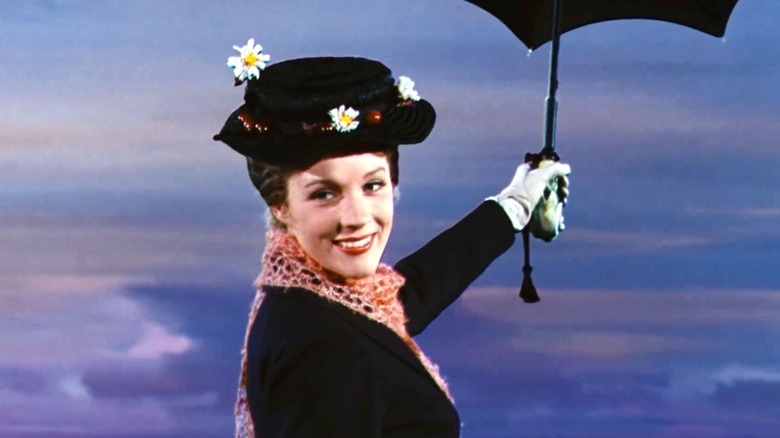 Mary Poppins (Julie Andrews) flying away on umbrella in Mary Poppins