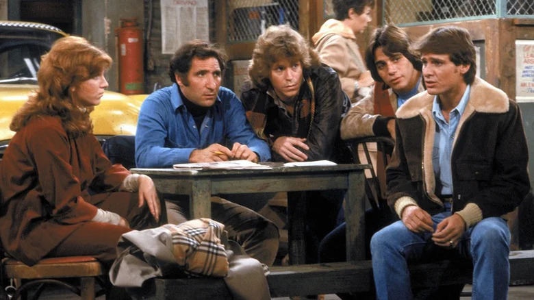 Marilu Henner, Judd Hirsch, Jeff Conaway, Tony Danza, and Randall Carver as Elaine Nardo, Alex Reiger, Bobby Wheeler, Tony Banta, and John Burns sit around the Sunshine Cab Company in Taxi