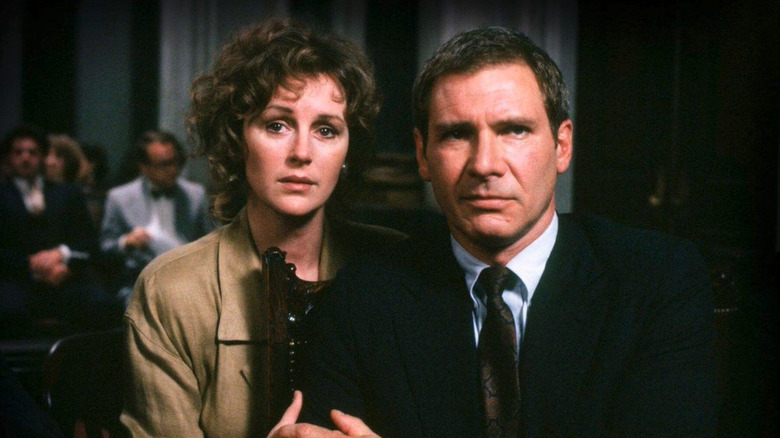 Harrison Ford and Bonnie Bedelia as Rusty and Barbara Sabich in court in Presumed Innocent