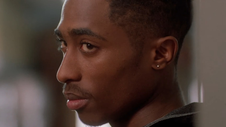 Roland (Tupac) leaning against a locker in Juice