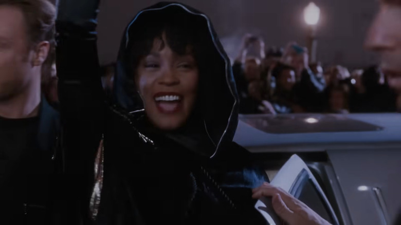 Rachel (Whitney Houston) waving at fans in The Bodyguard