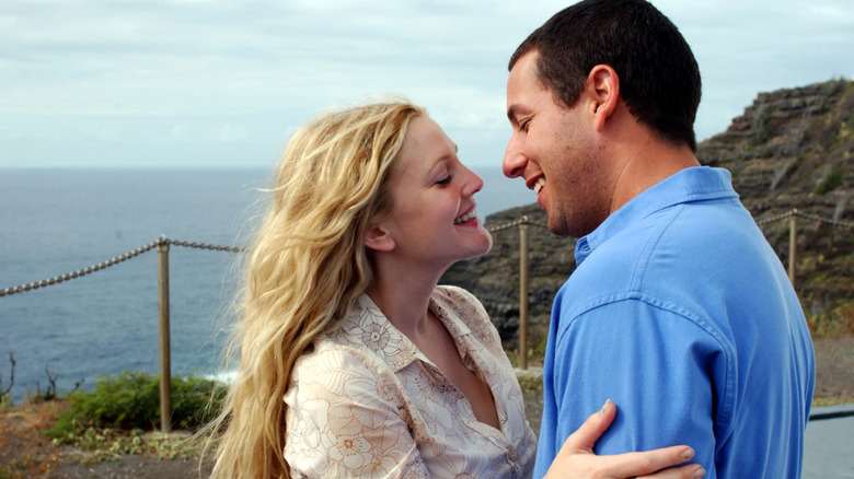 Drew Barrymore and Adam Sandler as Lucy and Henry embracing in 50 First Dates