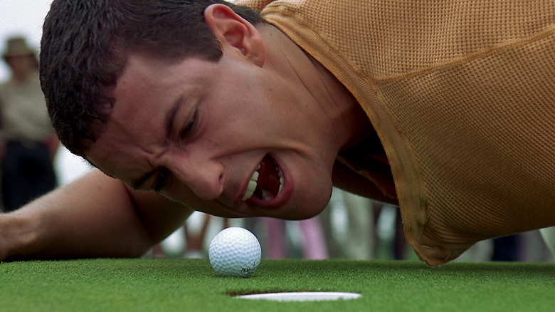 Adam Sandler as Happy yelling at a golf ball in Happy Gilmore