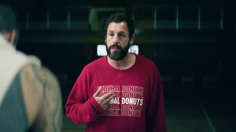 Adam Sandler as Stanley on a basketball court in Hustle