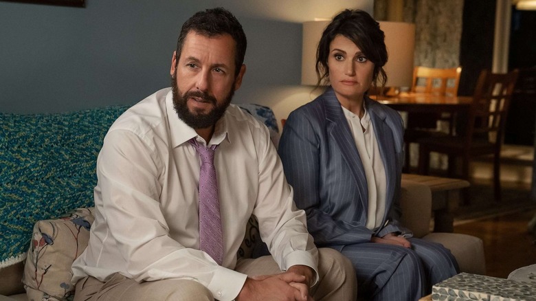 Adam Sandler and Idina Menzel as Danny and Bree wearing suits in You Are So Not Invited To My Bar Mitzvah