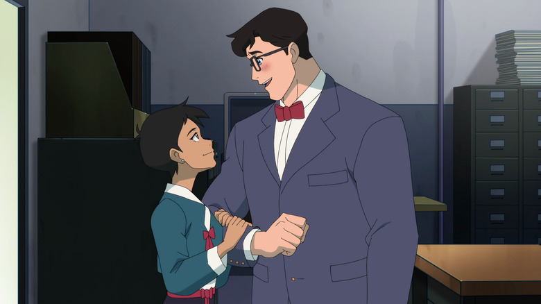 Lois Lane (Alice Kim) grabs the arm of Clark Kent (Jack Quaid) in My Adventures with Superman