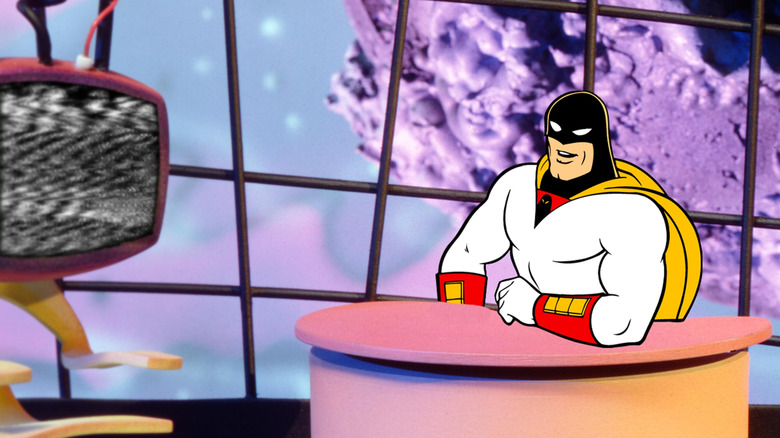 Space Ghost (George Lowe) sits proudly at his desk in Space Ghost Coast to Coast