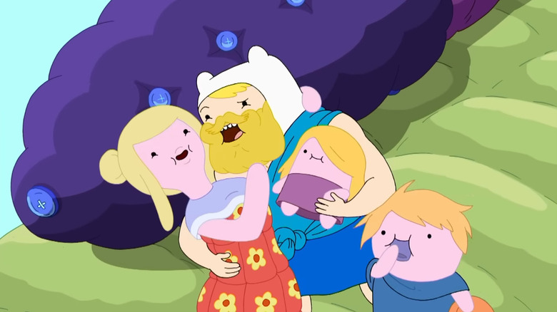 Adult Finn hugs his wife and kids on Adventure Time
