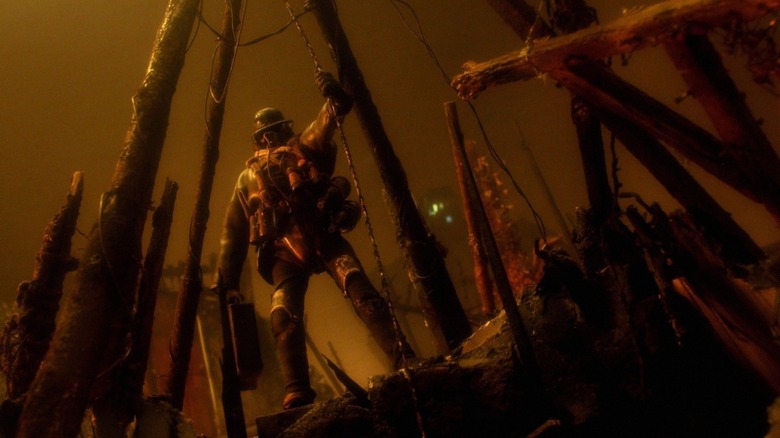 The assassin, voiced by Jake Freytag, descending into hell in Mad God