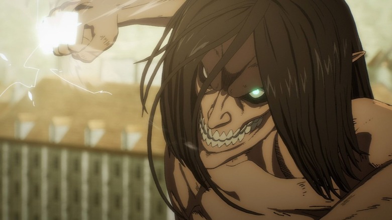 Eren Yeager, transformed into a Titan, winds up a seismic punch in Attack on Titan