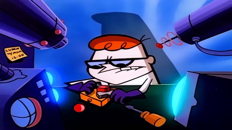 Dexter uses a wrench on a remote control in Dexter's Laboratory