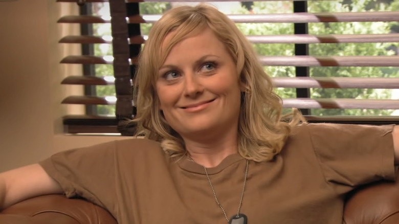 Amy Poehler as Gob's wife, smiling in fatigues on Arrested Development