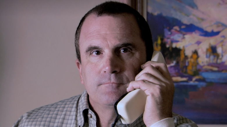 Steve Ryan as J. Walter Weatherman, taking a phone call on Arrested Development