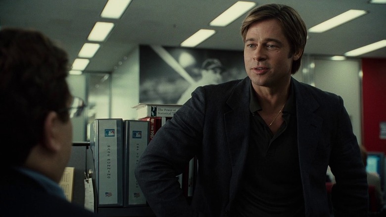 Brad Pitt as Billy Beane talking to Jonah Hill as Peter Brand in Moneyball.