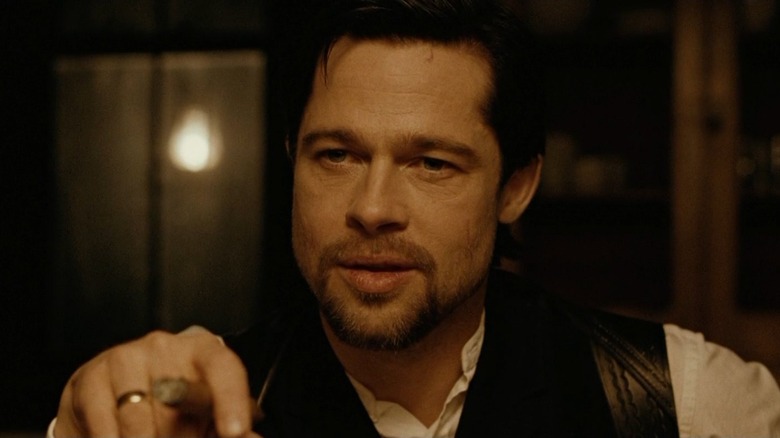 Brad Pitt as Jesse James in The Assassination of Jesse James by the Coward Robert Ford, looking off camera.