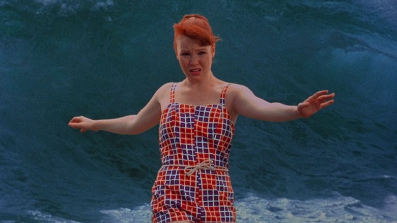 Lauren Ambrose as Florence "Chicklet" Forrest surfing a wave in Psycho Beach Party