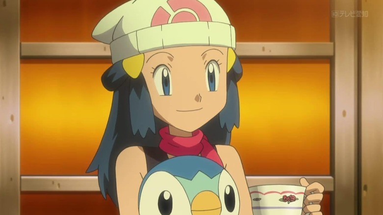 Dawn holding Piplup and a tea cup in Pokemon the Series: Black & White