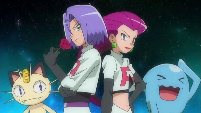 Meowth, James, Jessie, and Wobuffett posing in front of a night sky in the Pokemon anime