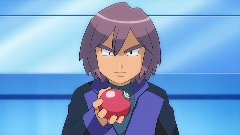 Paul frowning and holding a Poke Ball in Pokemon the Series: Diamond & Pearl