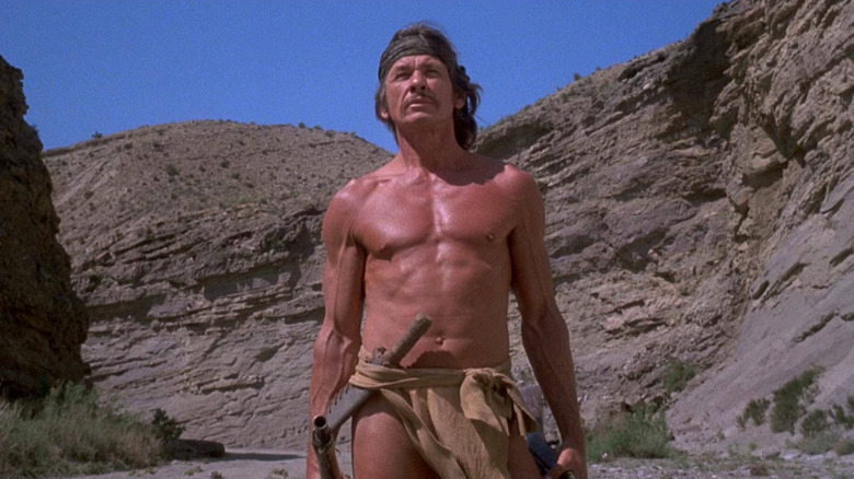 Charles Bronson as Chato, showing off his fifty-year-old physique in Chato's Land