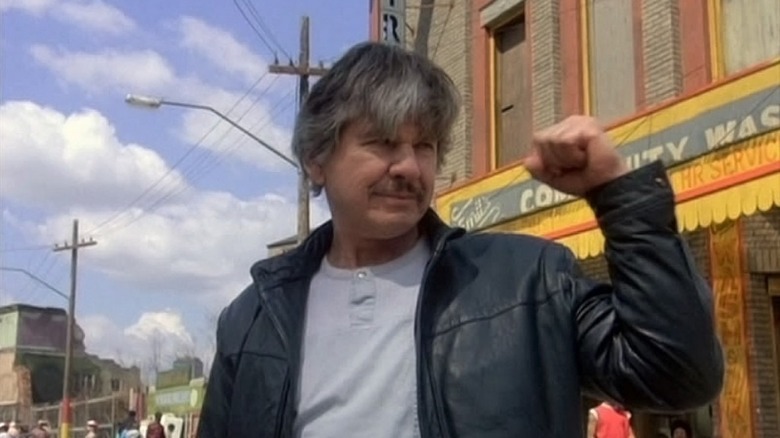 Charles Bronson as Paul, celebrating in Death Wish 3